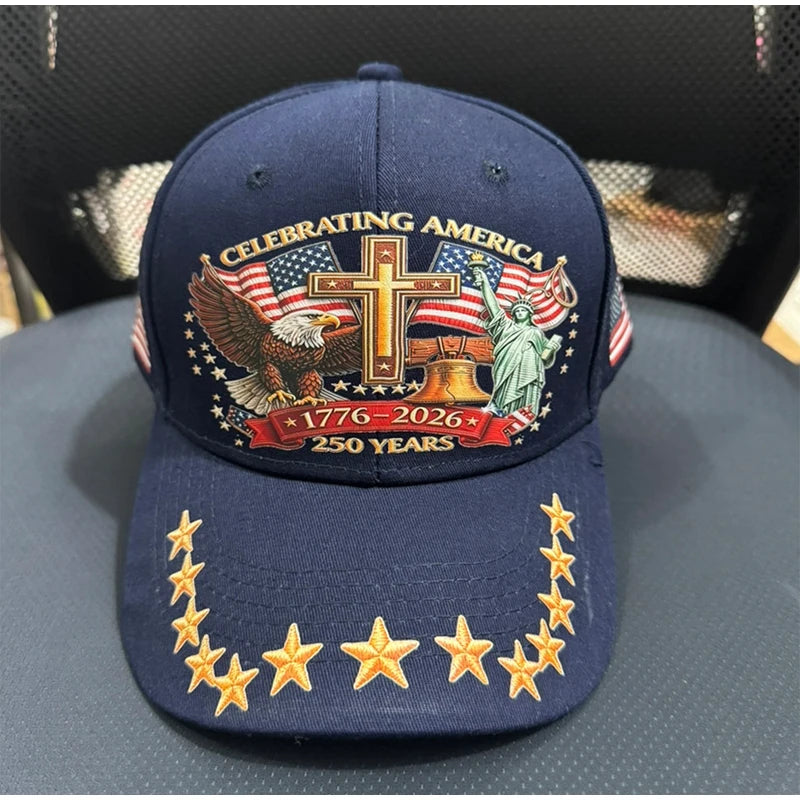 Navy baseball cap featuring a graphic of an eagle, a cross, and a statue of liberty with patriotic text.