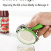A hand is using a stainless steel bottle opener to open the lid of a jar, demonstrating a buckle design feature.