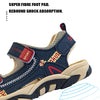 A view of a navy blue and tan sport foot pad sandal with adjustable straps.