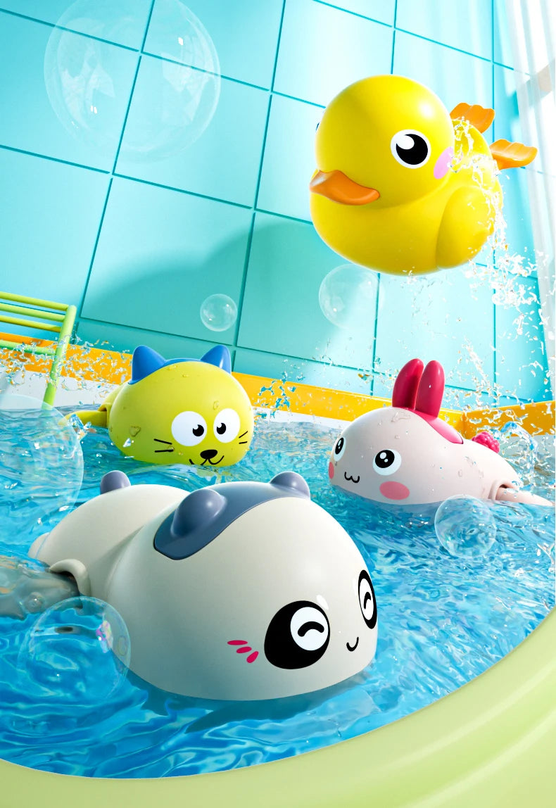 Cute yellow duck and white penguin bath toys floating in blue water with water spray bubbles