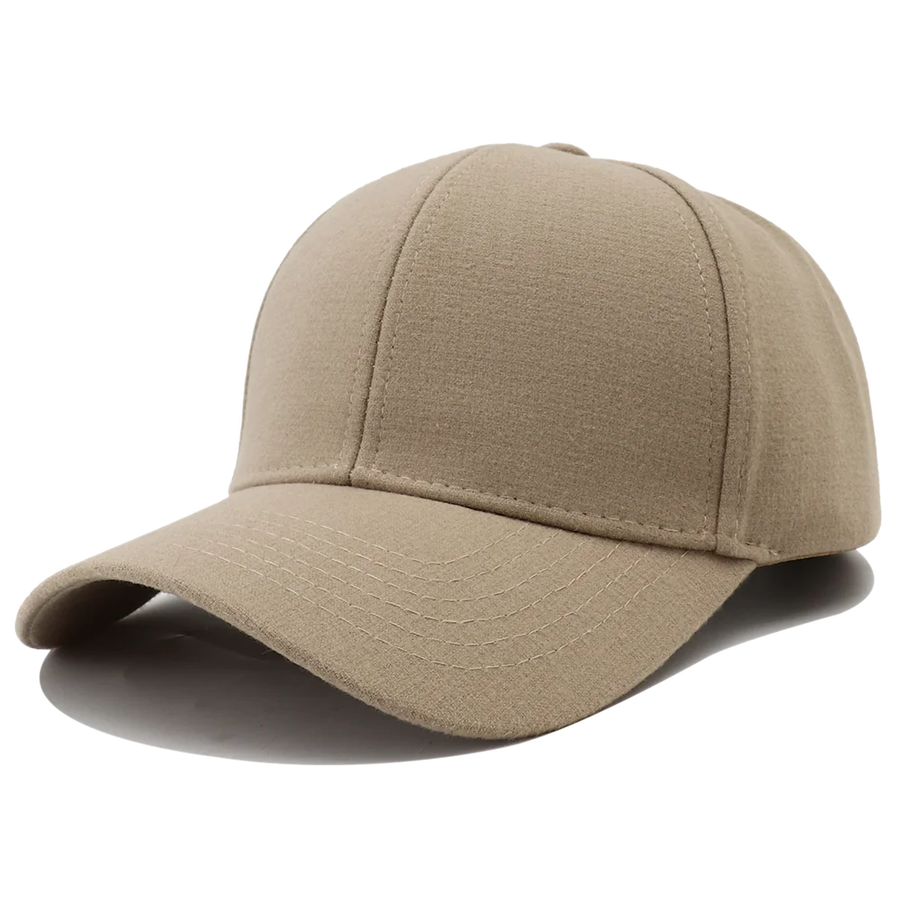 A beige classic cotton baseball cap shown from the side with a slight downward angle.