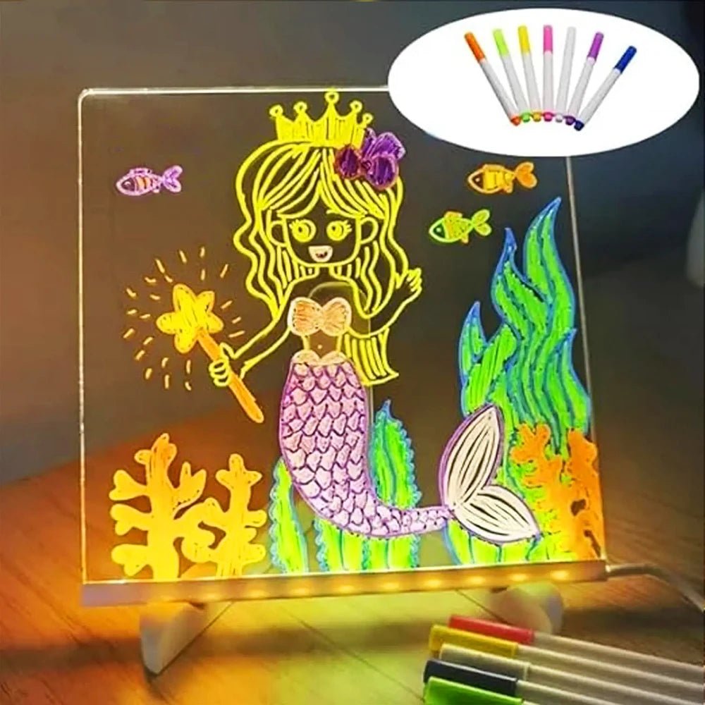 An LED glowing message board displays a princess figure and fish, with a set of seven colored pens shown above.