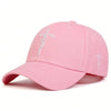 En lyserød broderet faith snapback kasket set fra siden.