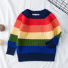A girls' rainbow striped knit sweater in various bright colors laid flat on a white surface.