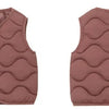 A solid rose pink quilted cotton vest shown from the front.