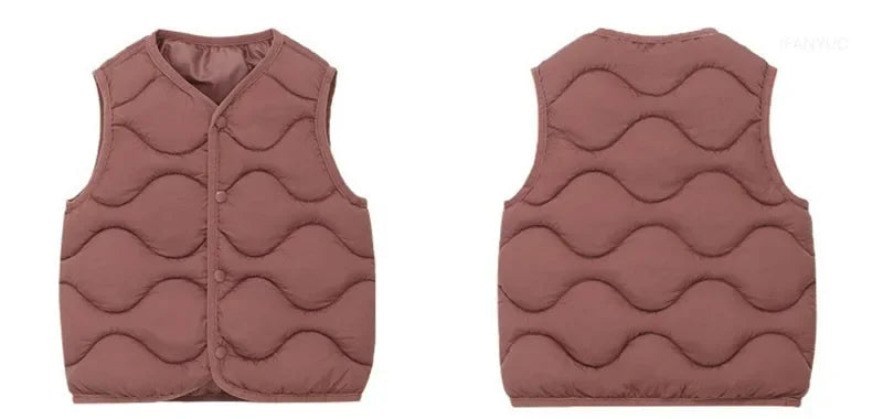 A solid rose pink quilted cotton vest shown from the front.