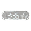 A rectangular digital wall clock displaying the time 12:36, temperature 15 degrees Celsius, and the day of the week.