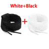 White and black flat elastic shoelaces in a coiled form for sneakers and casual shoes