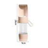 Botella de agua portátil para perros color beige con recipiente transparente para comida acoplado.