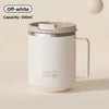 Off-white double wall insulated stainless steel travel mug with a silver lid and handle