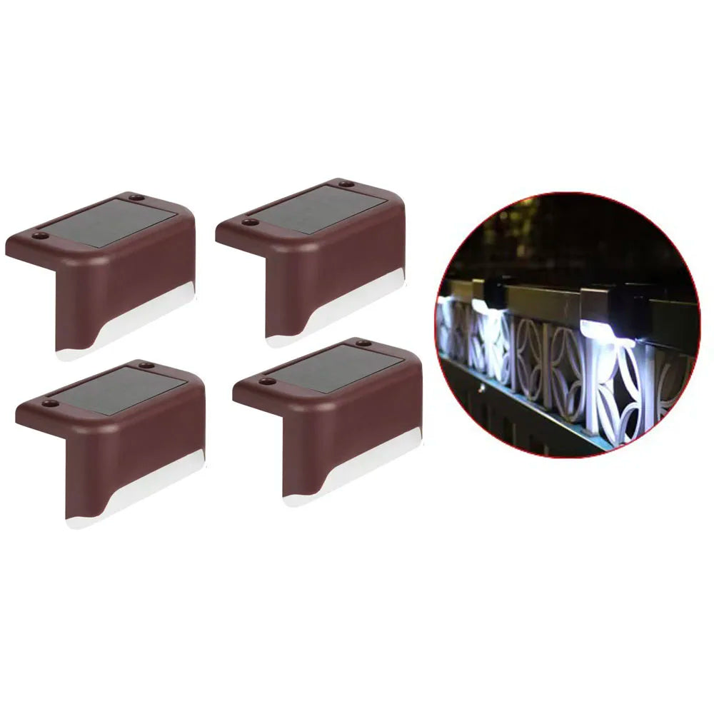 Four solar powered deck lights in a brown housing with illuminated LED strips shown alongside an inset photo.