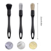 A set of three black detailing brushes with varying bristles and wooden handles shown next to circular swatches.