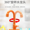 An orange faucet with a 360-degree rotating nozzle is shown mounted on a play kitchen sink.