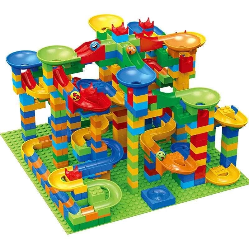 A colorful marble race run building blocks set featuring funnel slides and various track components.