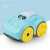 A light blue clockwork floating bath toy vehicle with sunglasses on a white background.
