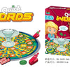 Box of Quick Words game featuring a catapult and various letter tiles for indoor fun