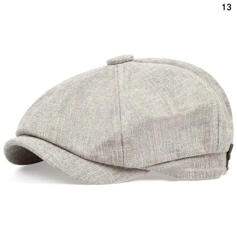 A light gray vintage retro newsboy cap with a folded brim shown from above.