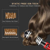 Primer plano de un cepillo de aire caliente giratorio usado en el cabello, mostrando la tecnología de iones libres de estátic