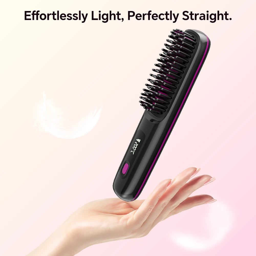 A hand holds a black hair straightening brush with a pink accent, demonstrating its use.