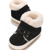 A pair of black baby winter snow boots with light beige faux fur trim and white soles.