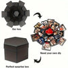 A kit showing a black geometric box, a finished surprise box, and an assortment of decorative inserts for a DIY gift box.