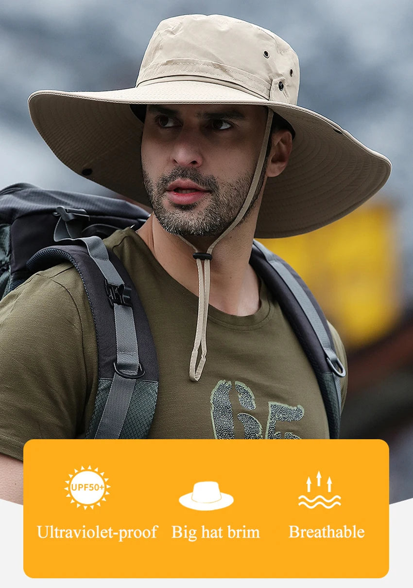 A man wearing a wide brim mesh bucket hat and a green shirt, demonstrating ultraviolet-proof and breathable features.