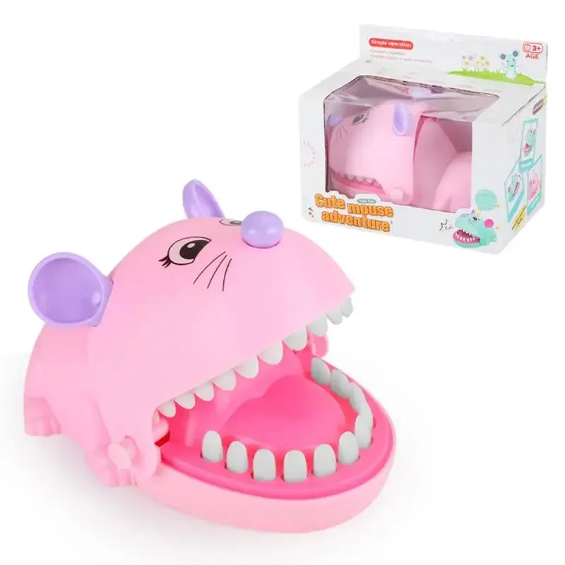 Jouet en forme d'éléphant rose avec bouche et dents, en boîte.