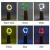 A set of LED fairy lights in various colors including warm white, green, white, yellow, blue, and red displayed on dark cylin