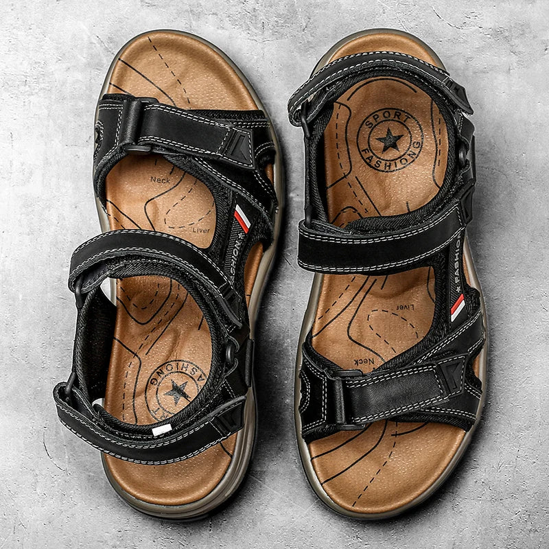 Pair of black leather air cushion sandals with brown straps and sole