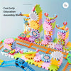 A colorful educational building set featuring gears, tracks, and vehicles built into a tower structure.