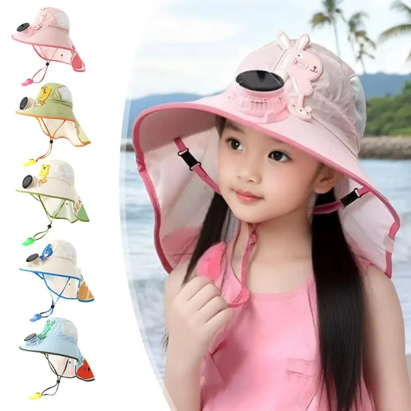 A young girl models a pink sun hat with a built-in USB fan and various attachments for cooling.