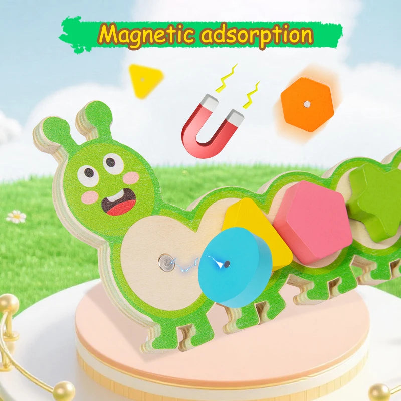 A green magnetic caterpillar puzzle toy with colorful shapes and pieces on a wooden base.