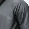 Close-up view of a dark gray waterproof windbreaker jacket sleeve and seam.