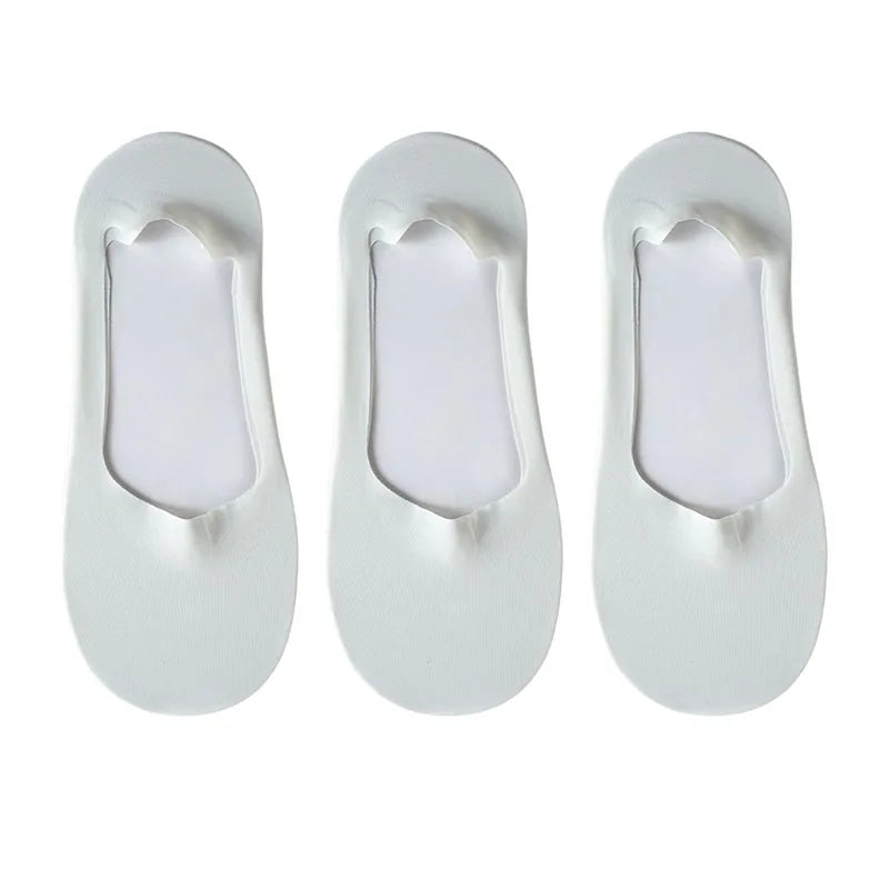 A pack of five white silicone grip no-show socks for men's feet.