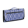 A portable waterproof baby changing pad with a blue and white diamond pattern and a black zipper.
