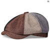 A vintage retro newsboy cap featuring a two-tone brown and gray fabric design.