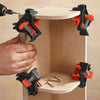 A hand is shown using adjustable right-angle clamps for woodworking and DIY projects.