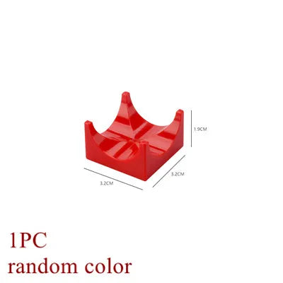 A single red marble run building block piece with dimensions 1.9cm by 3.2cm.