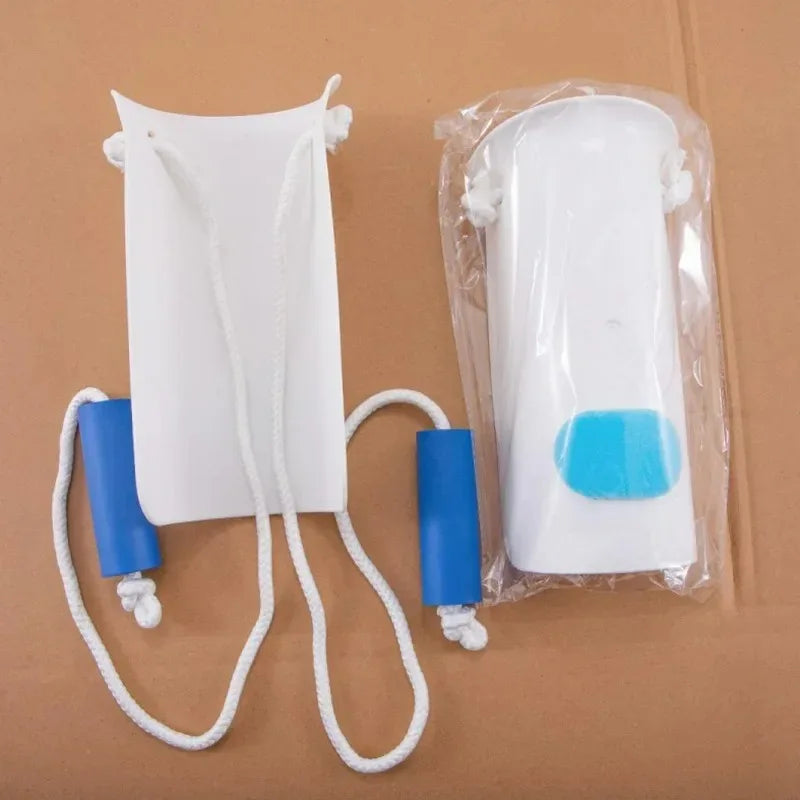 White sock aid for seniors with blue accents packaged in plastic on brown cardboard.