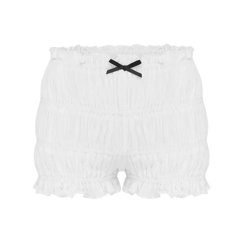 White ruffled tiered shorts with a black bow detail
