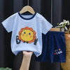A light blue kids' short-sleeve t-shirt and shorts set featuring a cartoon lion print.