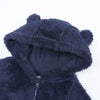 A dark blue baby fleece hooded romper with a zipper is shown in a close-up view.
