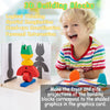 A young child is interacting with 3D building blocks and a graphics card for a logical thinking game.