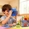 A young boy is using a blue 3D viewing glass on his face in a classroom setting.