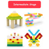 A set of yellow and green building bricks arranged in various structures, including a house and a winged figure.
