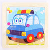A jigsaw puzzle depicting a blue police car with yellow lights and a green roof.
