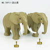 A set of three elephant figures in a beige color, used as building blocks.