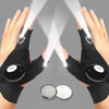 Pair of black LED fingerless gloves with built-in flashlights demonstrating light beams.