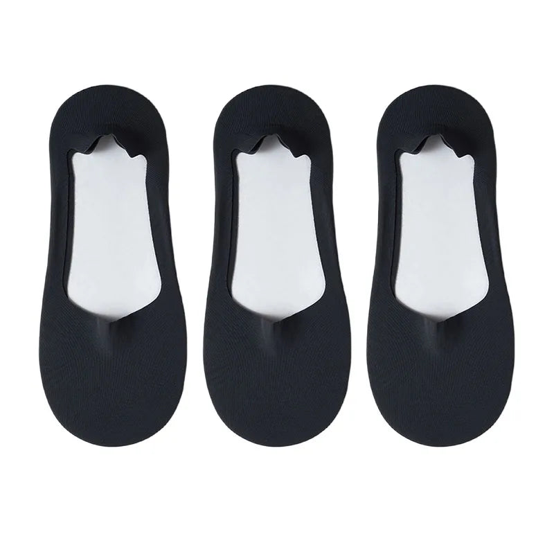 A pack of five black men's no-show socks with silicone grip shown from the top view.