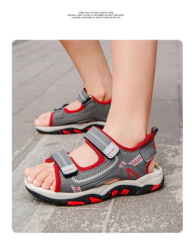 A close-up of gray and red breathable summer sport sandals for boys, showing the adjustable straps and sole.